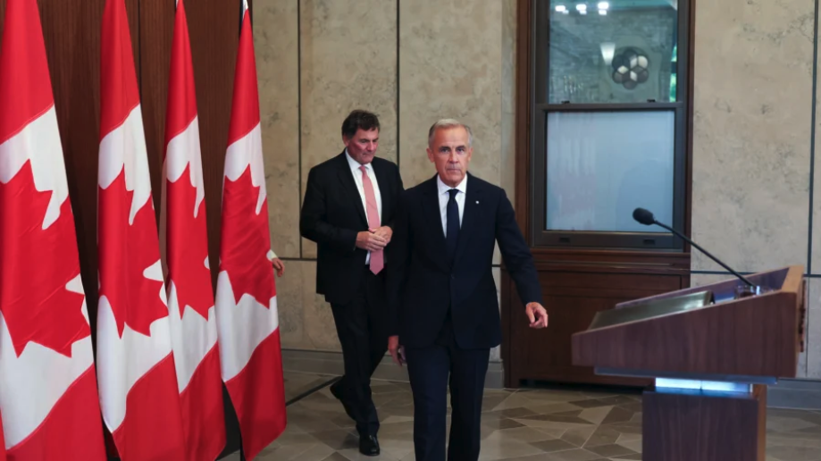Canadian Prime Minister Mark Carney and Dominic LeBlanc, Minister responsible for Canada-US Trade, arrive at a press conference after trade talks with the US collapsed in Ottawa, Canada, on Aug. 22, 2026. (Dave Chan/AFP via Getty Images)