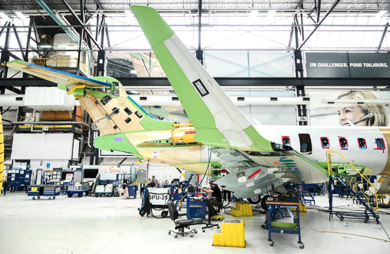 A Bombardier Challenger aircraft under construction at the Bombardier manufacturing facility in Montreal, Quebec, Canada, on Feb. 18, 2025. Graham Hughes/AFP via Getty Images