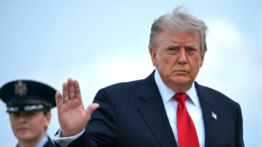 President Donald Trump waves as he boards Air Force One at Joint Base Andrews, Md., on July 27, 2026. (Brendan Smialowski/AFP via Getty Images)