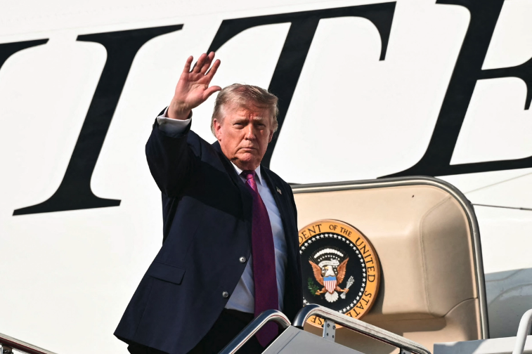 President Donald Trump waves as he boards Air Force One before departing Joint Base Andrews, Md., on July 3, 2026. Mandel Ngan/AFP via Getty Images
