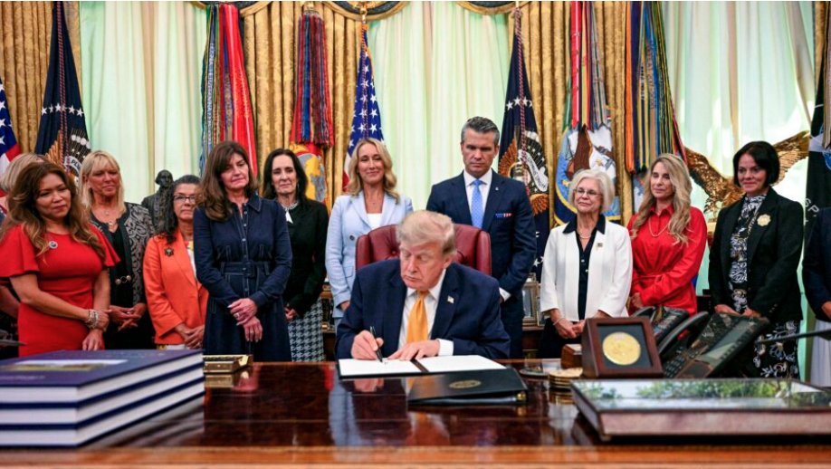 President Donald Trump displays an executive order he signed in the Oval Office of the White House on Aug. 3, 2026. (Jim Watson/AFP via Getty Images)